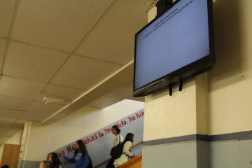 New TV up at the front of the school ready to function. 