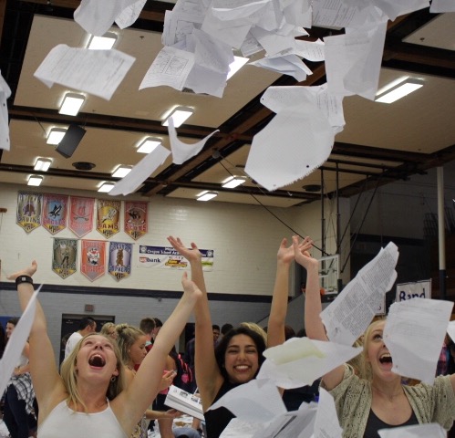 Seniors toss away their high school worries in annual Paper Toss