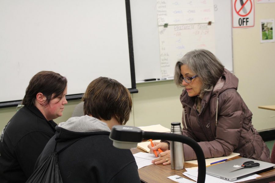 Spanish teacher Mrs. Cavanagh during a conference with one of her Spanish 3-4 students 
