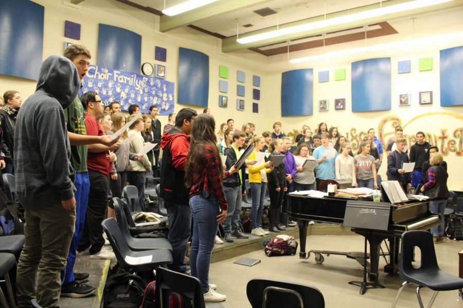 Choir students practicing during class