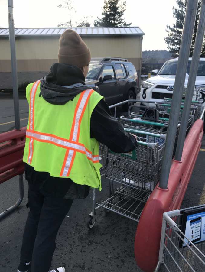 Senior Cirilo Aguilar working at Fred Myers 