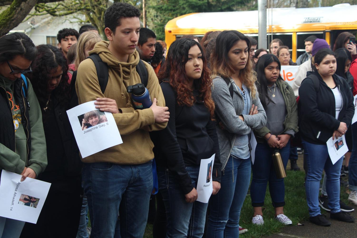 Students silently reflect on the lives lost one month to the day, in a mass shooting at a public high school, much like our own.