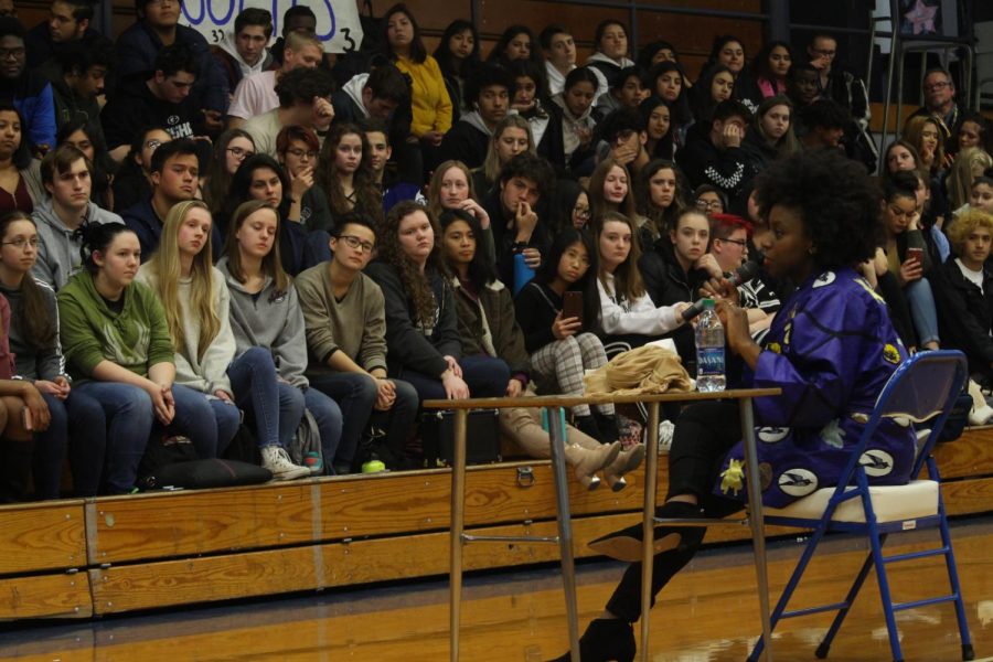 Adichie speaking to the students at assembly on March 14th.