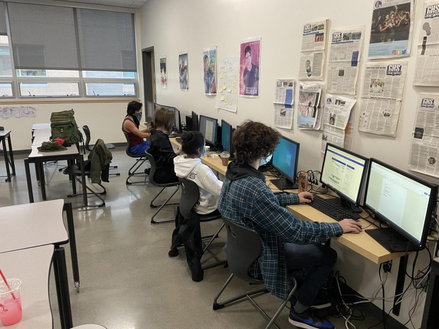 The Argus crew create the newspapers pages using Indesign.