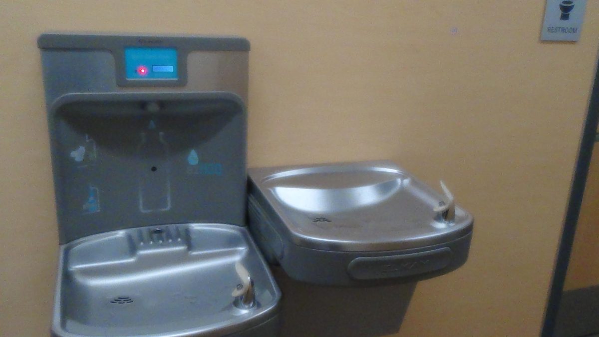 A water fountain on the second floor needs a filter change, as evident by the red light. 